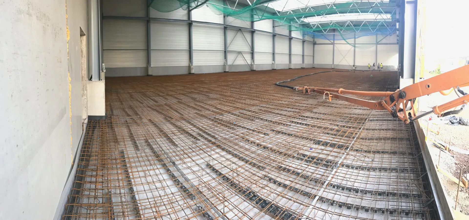 Betoneinbau mit Pumpe — Verteilung über Schlauchausleger